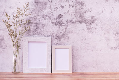 Window on white wall of building