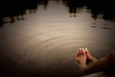 Legs of woman in water