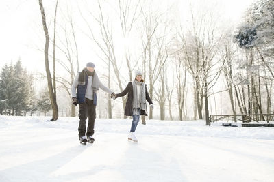 Senior couple ice skating