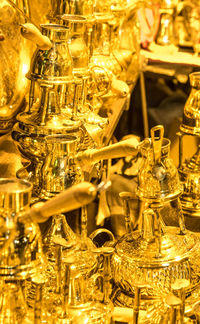 Close-up of wine glasses on display at store