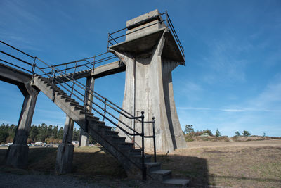 Low angle view of old bridge against sky