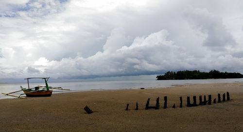 Scenic view of beach against sky