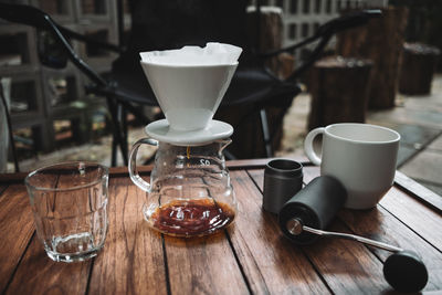 Barista dripping coffee and slow coffee bar style