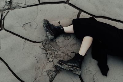 High angle view of woman sitting outdoors