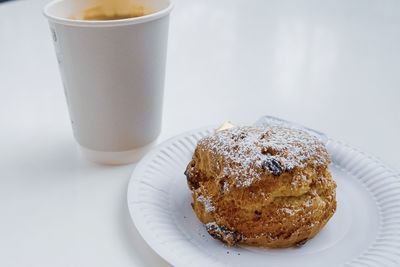 Close-up of coffee in cup on table