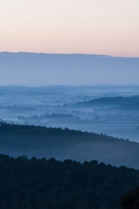 Scenic view of landscape against sky during sunset
