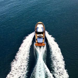 Power boat,leaving wake,viewed from above