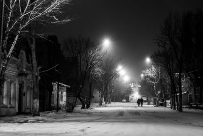 Illuminated street light at night