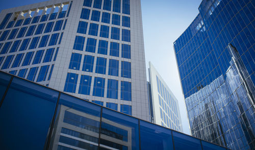 Low angle view of modern building against clear sky