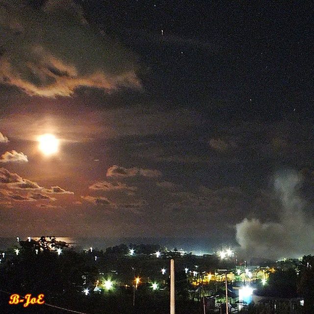 sky, illuminated, night, cloud - sky, city, cityscape, built structure, architecture, building exterior, scenics, cloudy, dramatic sky, nature, weather, beauty in nature, cloud, outdoors, no people, storm cloud, dusk