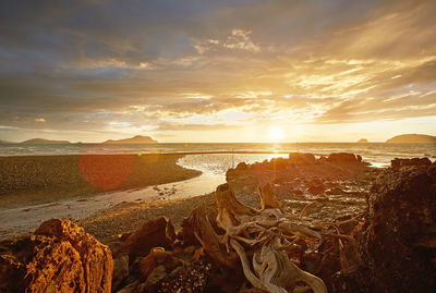 Scenic view of sea against sky during sunset