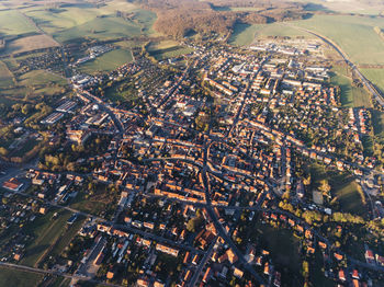 High angle view of cityscape seen through airplane window