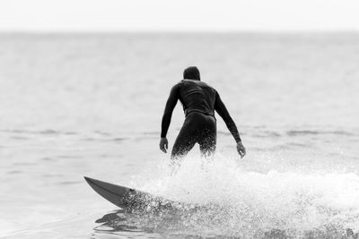 Man surfing in sea