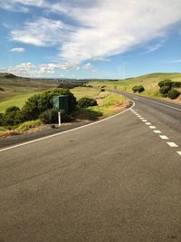 Road passing through rural landscape