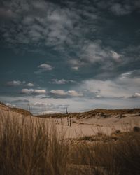 Scenic view of land against sky