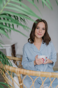 Portrait of young woman smiling