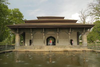 Built structure against cloudy sky