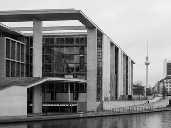 Modern buildings in city against sky