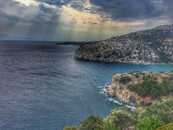 Scenic view of sea against cloudy sky