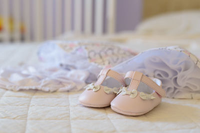 Close-up of shoes on table