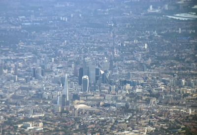 Overlooking the urban sprawl of the city of london from an airplane