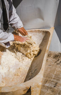 Man working on cutting board