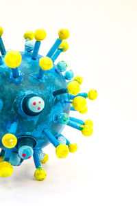 Close-up of multi colored toy against white background