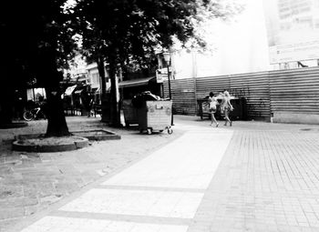 People walking on city street