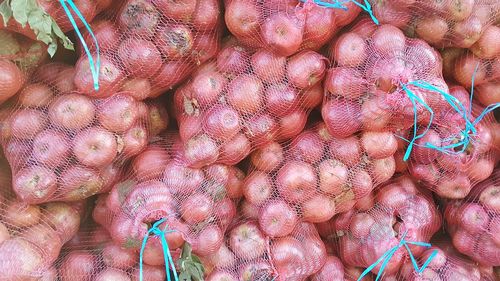 Full frame shot of onions for sale in market