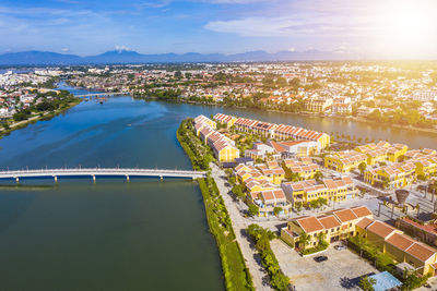 High angle view of river amidst buildings in city