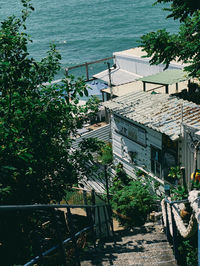 High angle view of townscape by sea