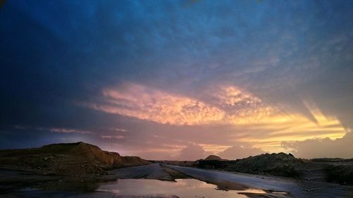 Scenic view of sea at sunset
