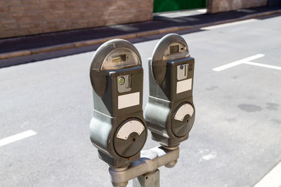 Older parking meters on a street in the thuringian town meiningen, germany