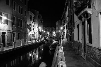 Illuminated buildings in city at night