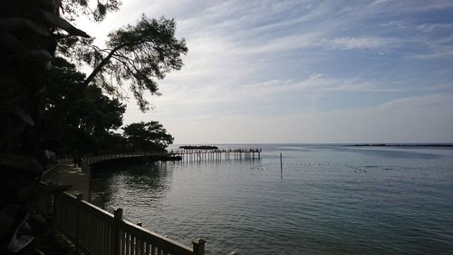 Scenic view of sea against sky at sunset