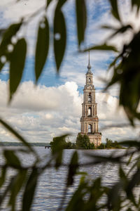 Clock tower of building against sky