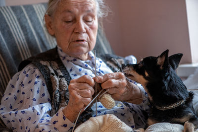 Portrait of woman with dog