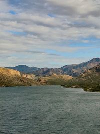 Scenic view of landscape against dramatic sky