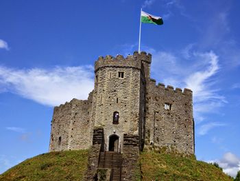 Low angle view of cardiff castle against sky