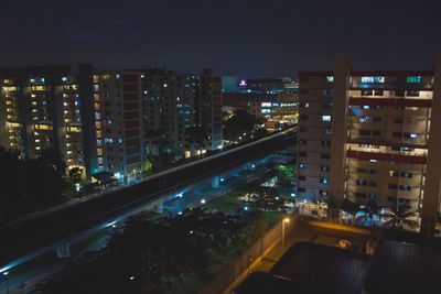 Illuminated cityscape at night