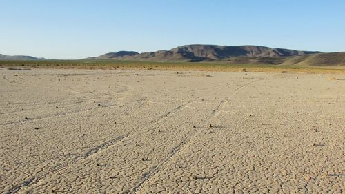 Dried lake bed, hostile territory