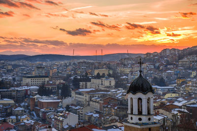 High angle view of city at sunset