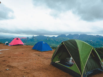 Tent on land against sky