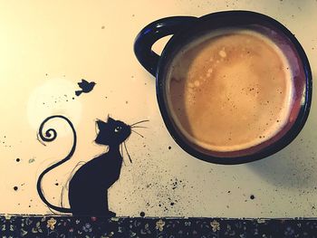 High angle view of coffee cup on table