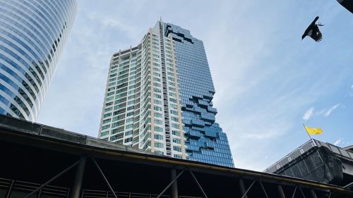 Low angle view of modern buildings against sky