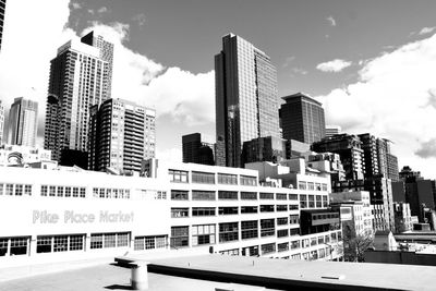 Modern buildings in city against sky