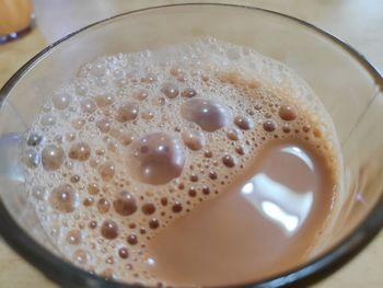 High angle view of coffee cup on table