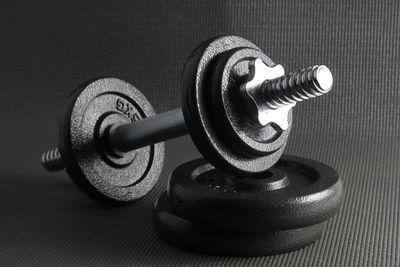 Close-up of dumbbells on table