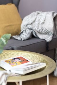 Close-up of book on table at home