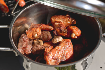 Close-up of meat in pan